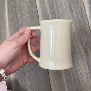 Cream/ white colored mug